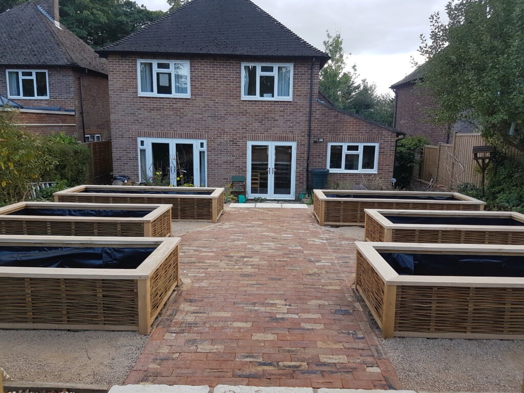 bespoke timber framed willow raised beds in formal kitchen garden